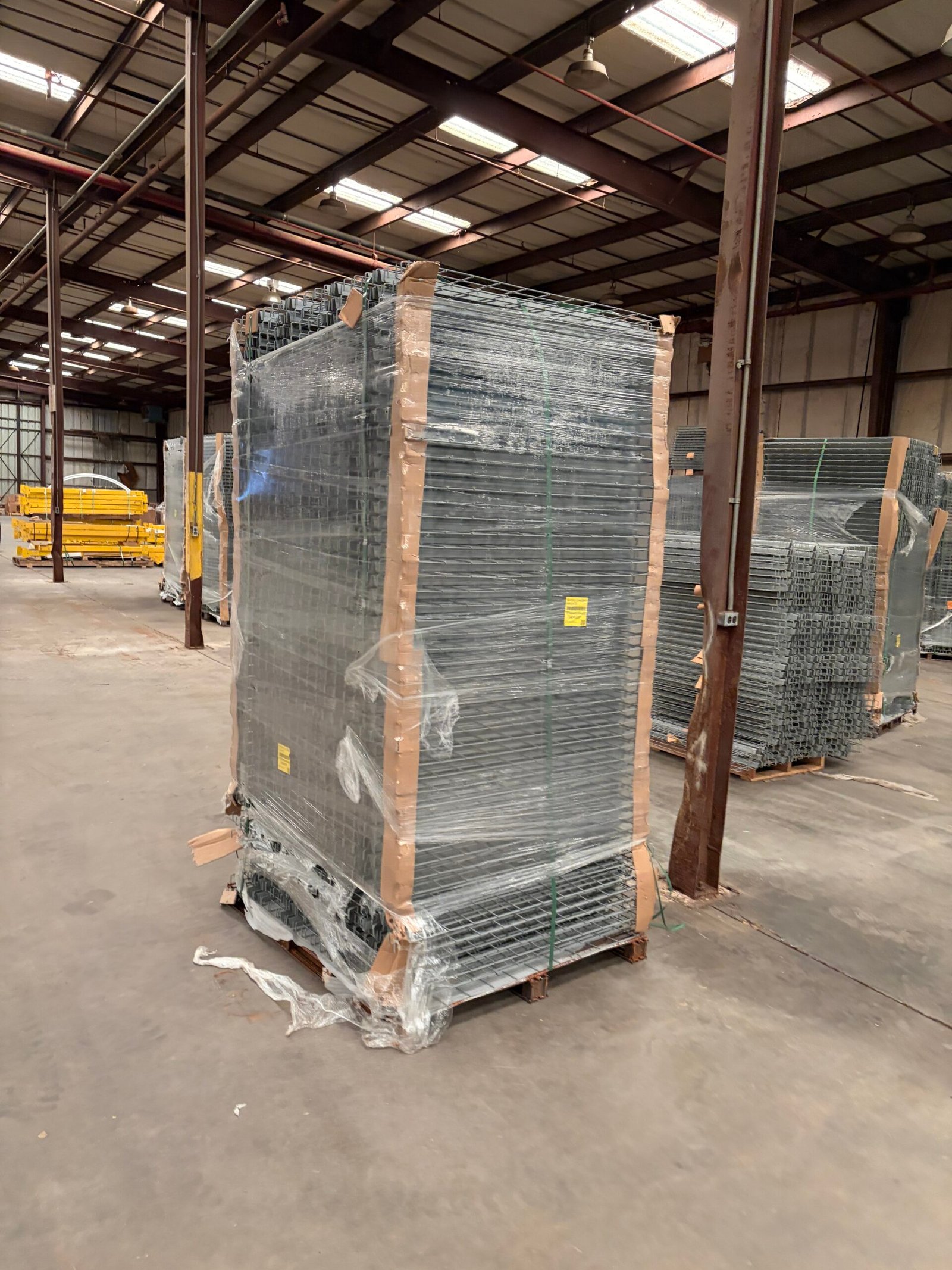 Wrapped and strapped pallet of new wire decking in the Jonesboro warehouse.